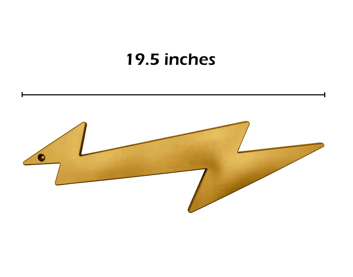 Gold lightning bolt prop held in hand — showing scale and grip for costume use