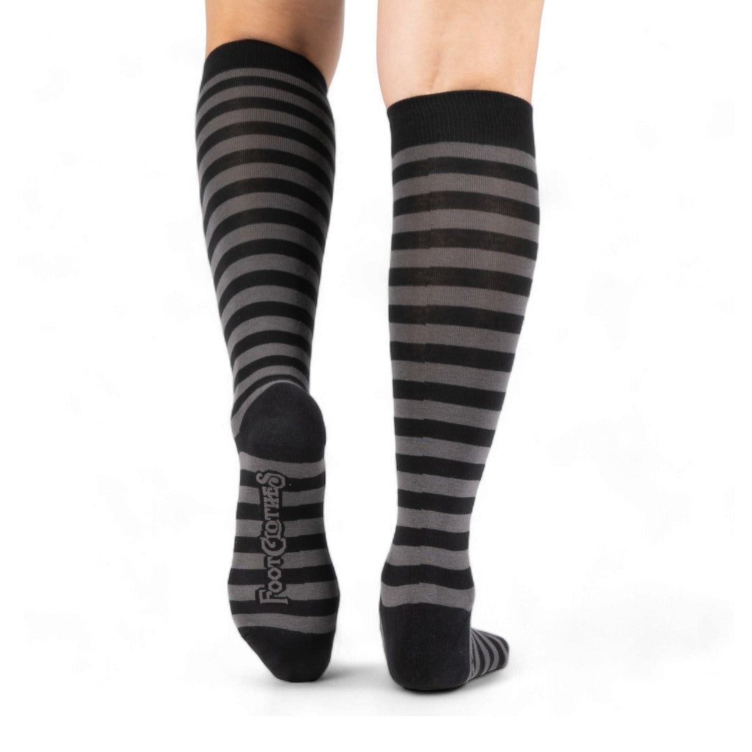 Smoke grey and black striped knee high socks — model close-up leg detail