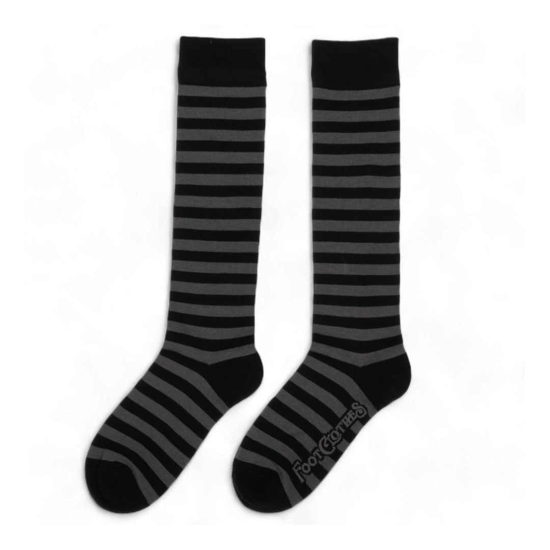 Smoke grey and black striped knee high socks — left sock flat lay