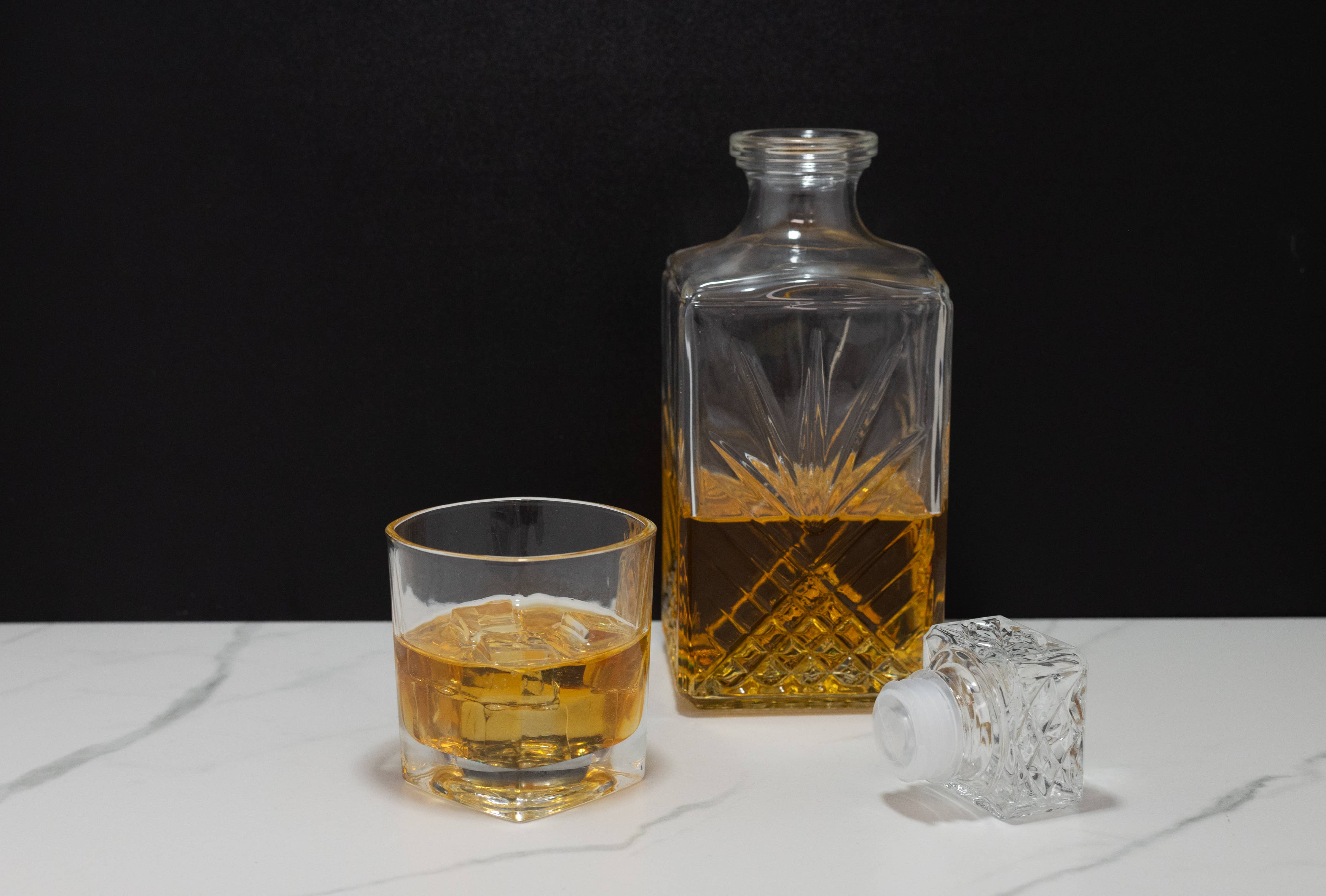 Fake scotch decanter — angled view showing stopper and faux liquid level