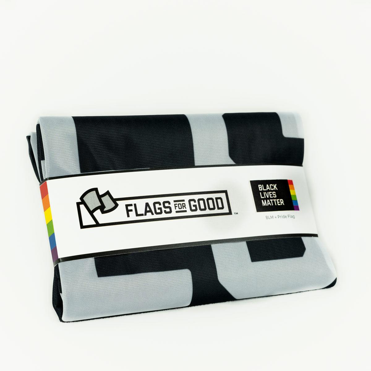 Black Lives Matter + Pride Flag — folded, showing black field and rainbow edge
