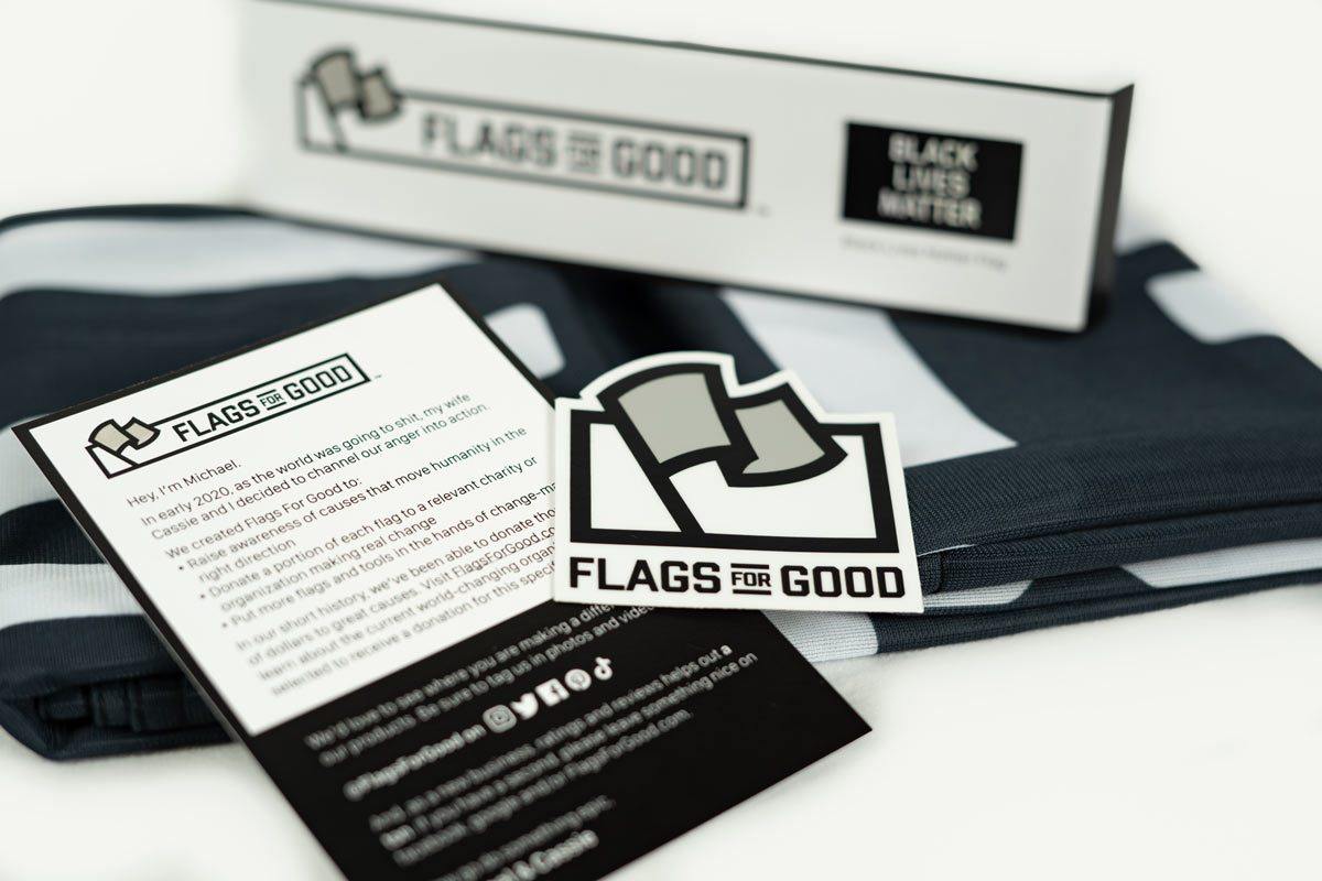 Black Lives Matter flag — unfolded flat lay showing full design