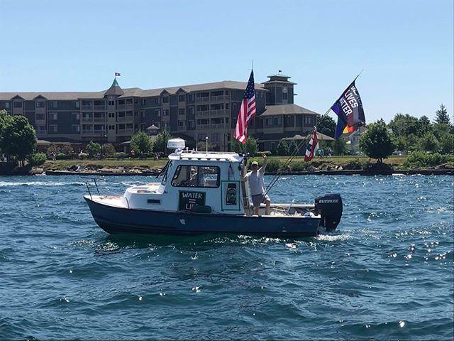 Black Lives Matter + Pride Flag displayed on a boat