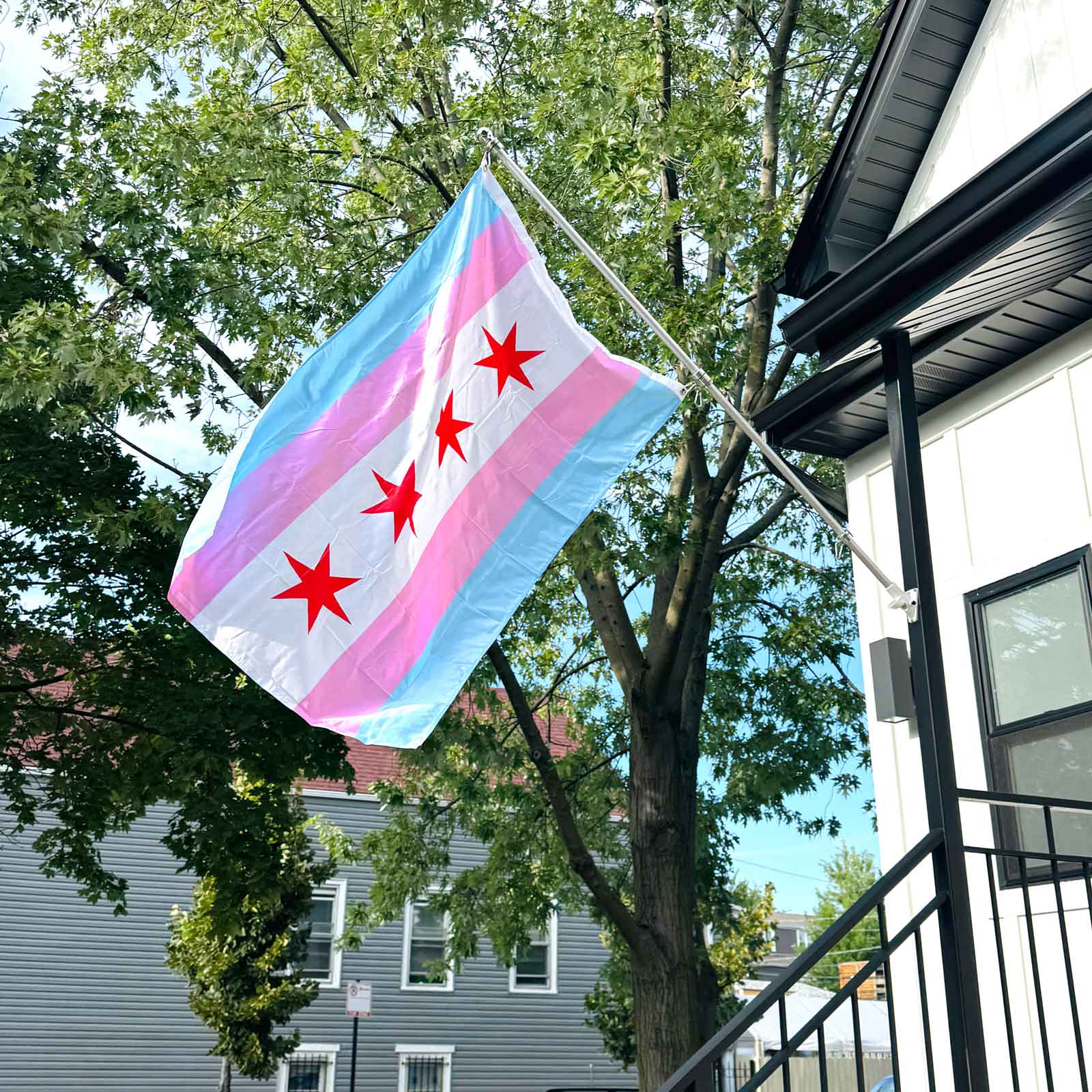 Chicago Transgender Pride Flag displayed on a house exterior