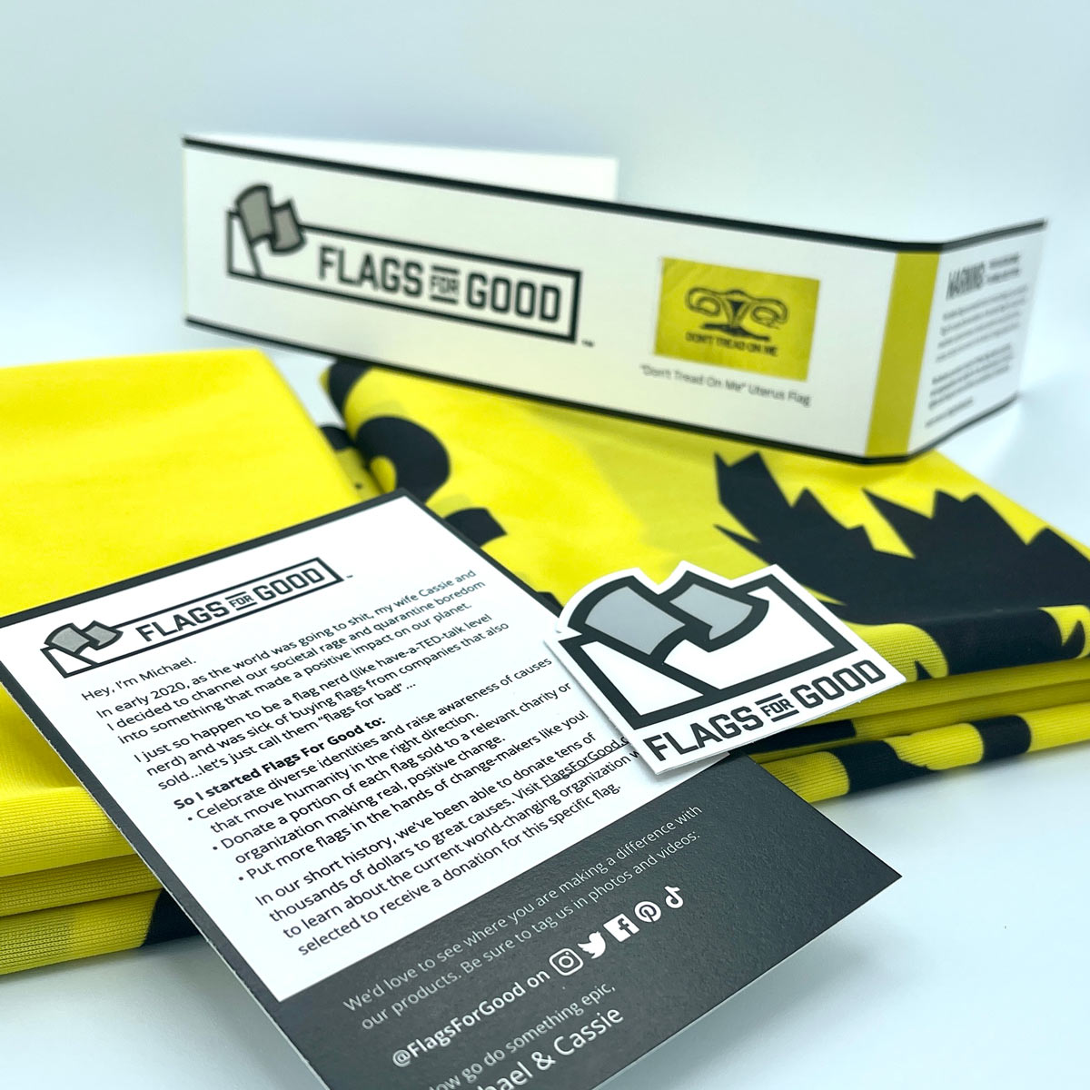 Don't Tread On Me Uterus Flag — unfolded flat lay showing full yellow design