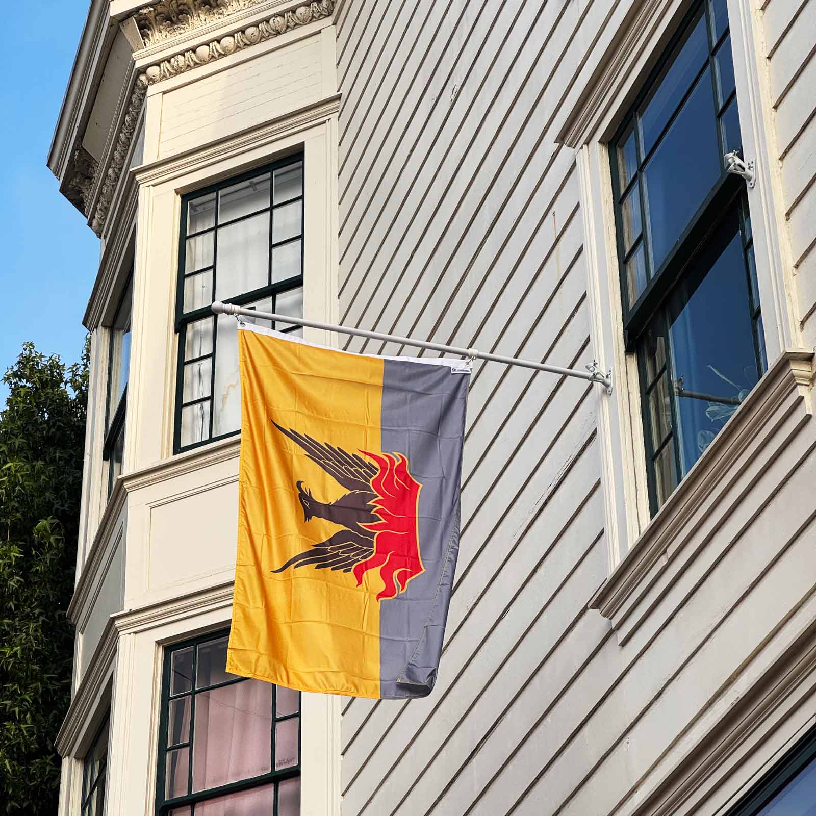 Fog & Gold San Francisco flag displayed on a house exterior