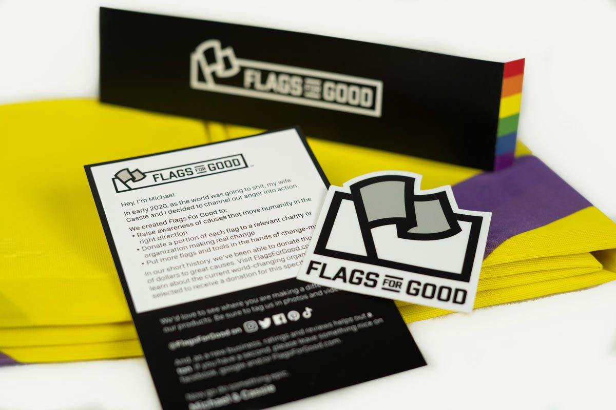 Intersex Pride Flag fully unfolded, yellow background with purple circle centered