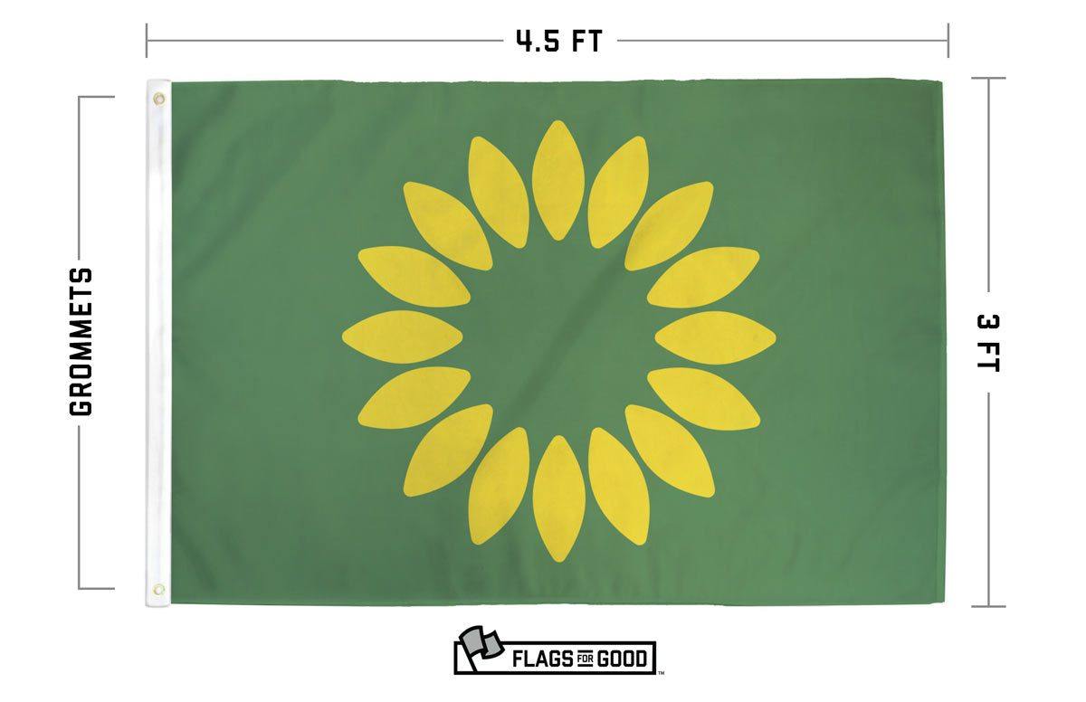 Redesigned Kansas flag flying, sunflower with 16 petals on green field