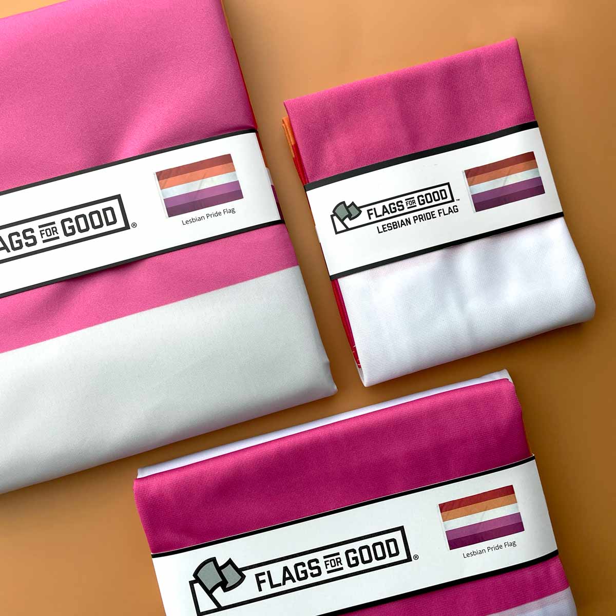 Lesbian Pride flag alongside other pride flags in a collection display