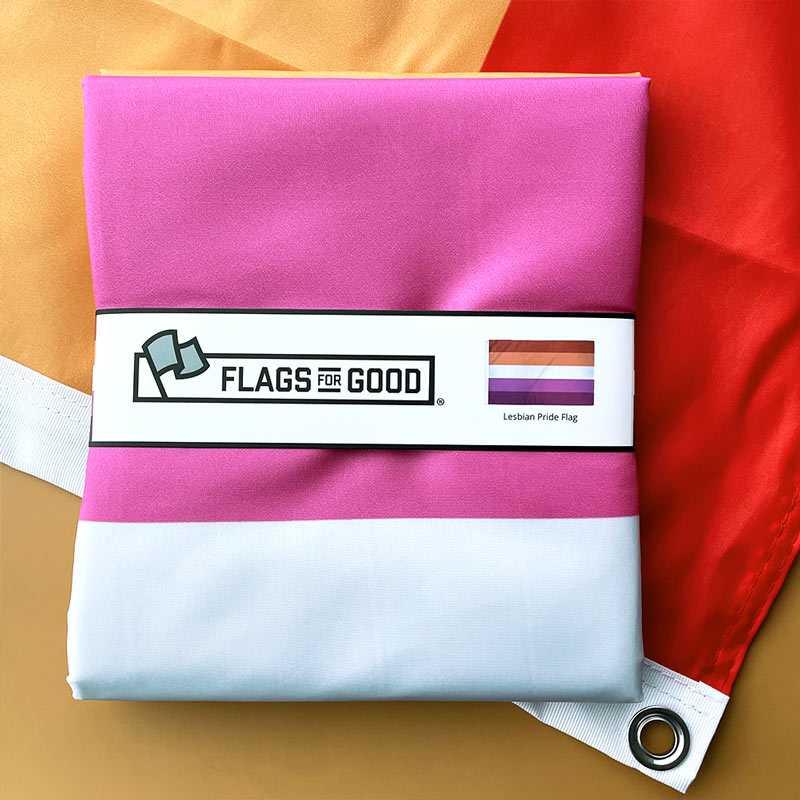 Lesbian Pride flag grommet close-up showing reinforced metal eyelet