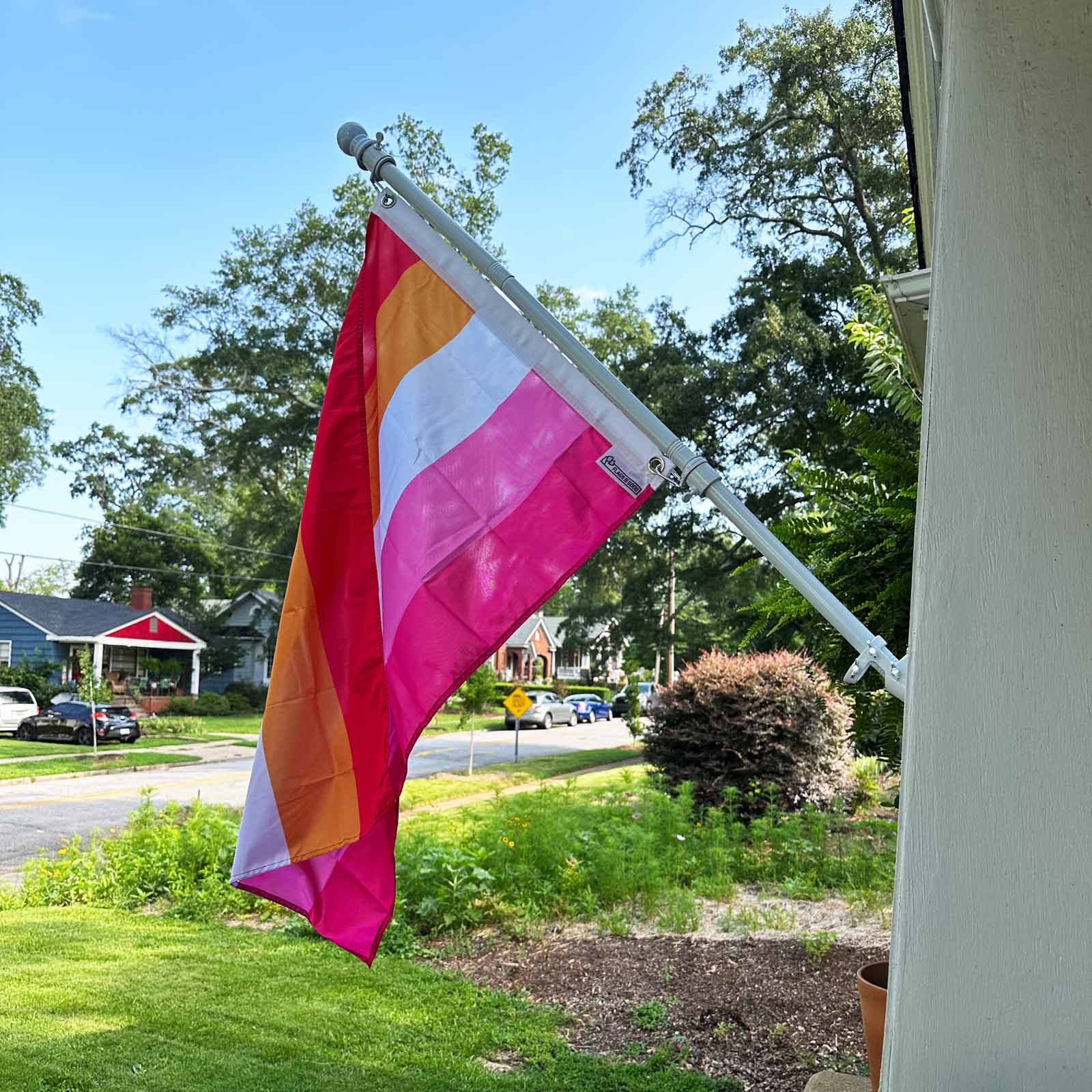 Lesbian Pride flag displayed on a house exterior