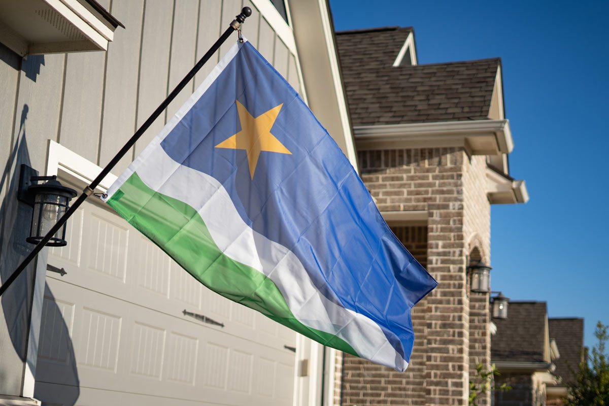 Minnesota North Star Flag flying on flagpole