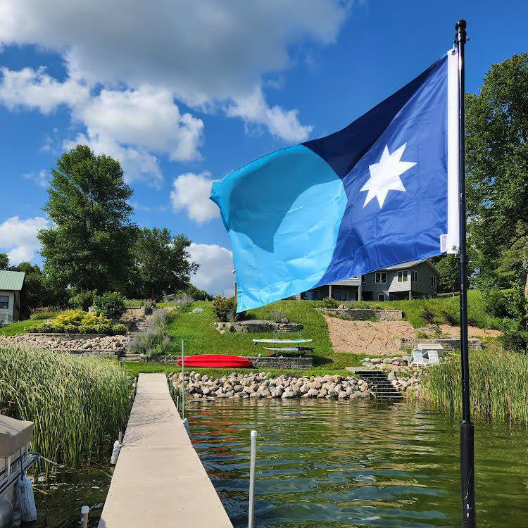 New Minnesota State Flag flying on a dock