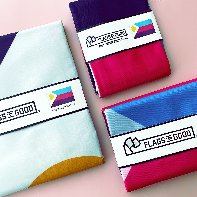 Polyamory Pride Flag — flat lay size comparison of 2ft x 3ft and 3ft x 5ft variants
