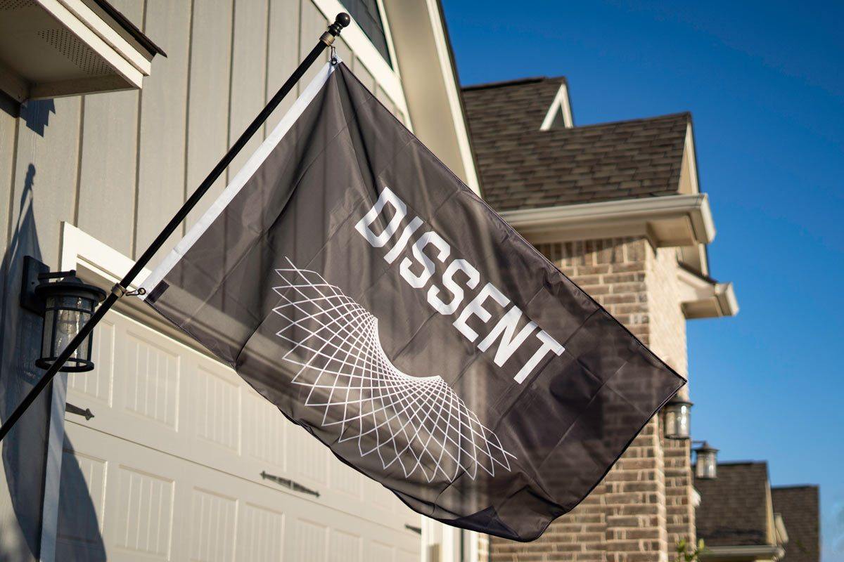RBG Dissent flag flying on a flagpole outdoors