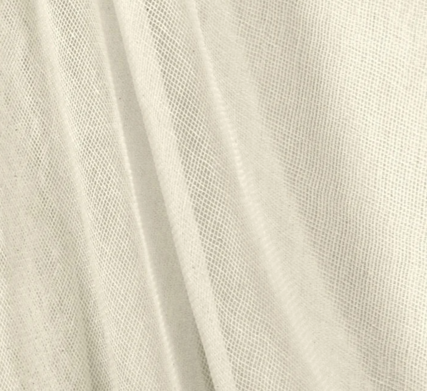 Natural shark tooth scrim — open-weave 100% cotton net showing diagonal tooth pattern