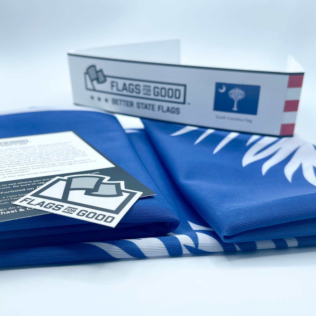 South Carolina flag — unfolded flat lay showing full palmetto and crescent design