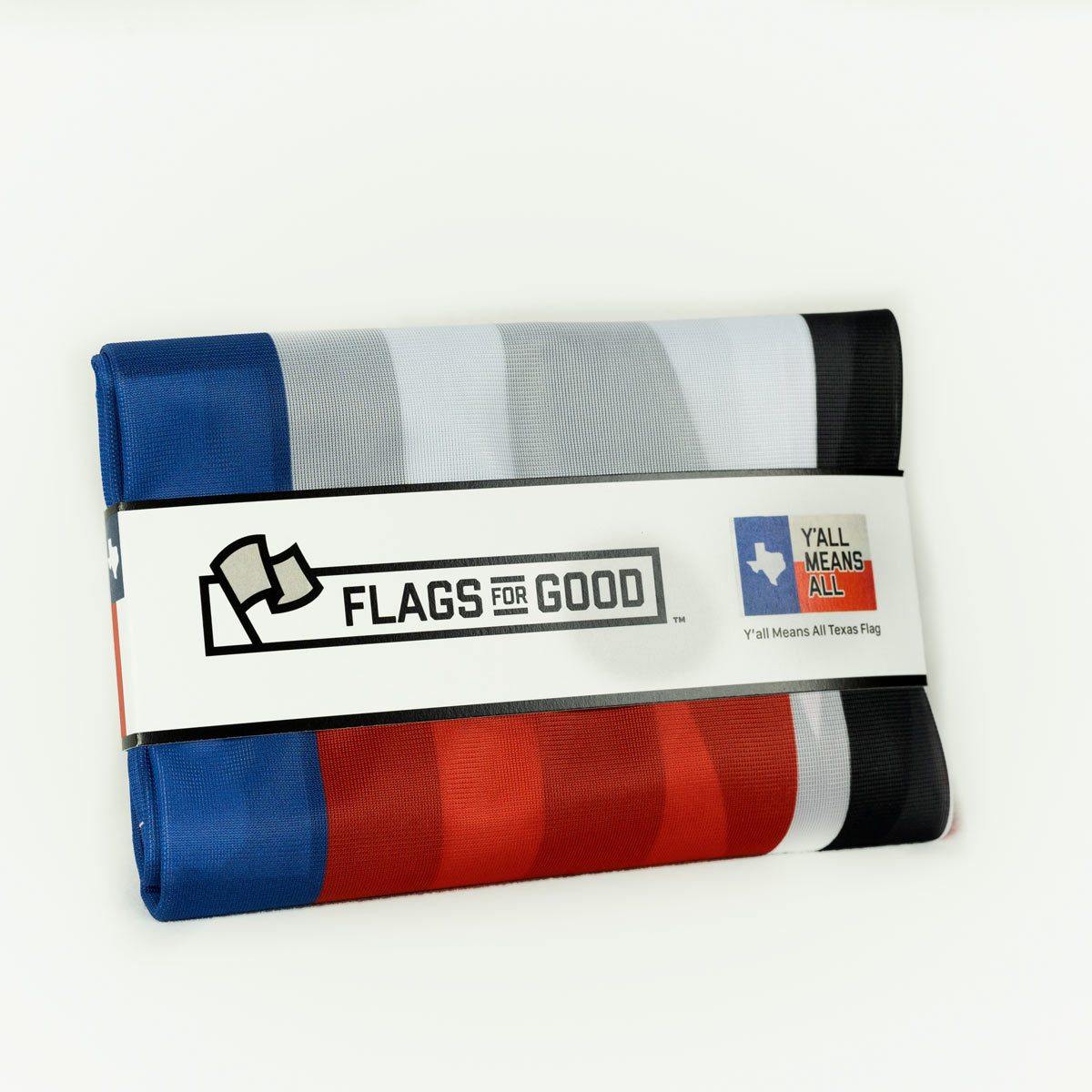 Y'all Means All Texas Flag folded — showing packaged presentation