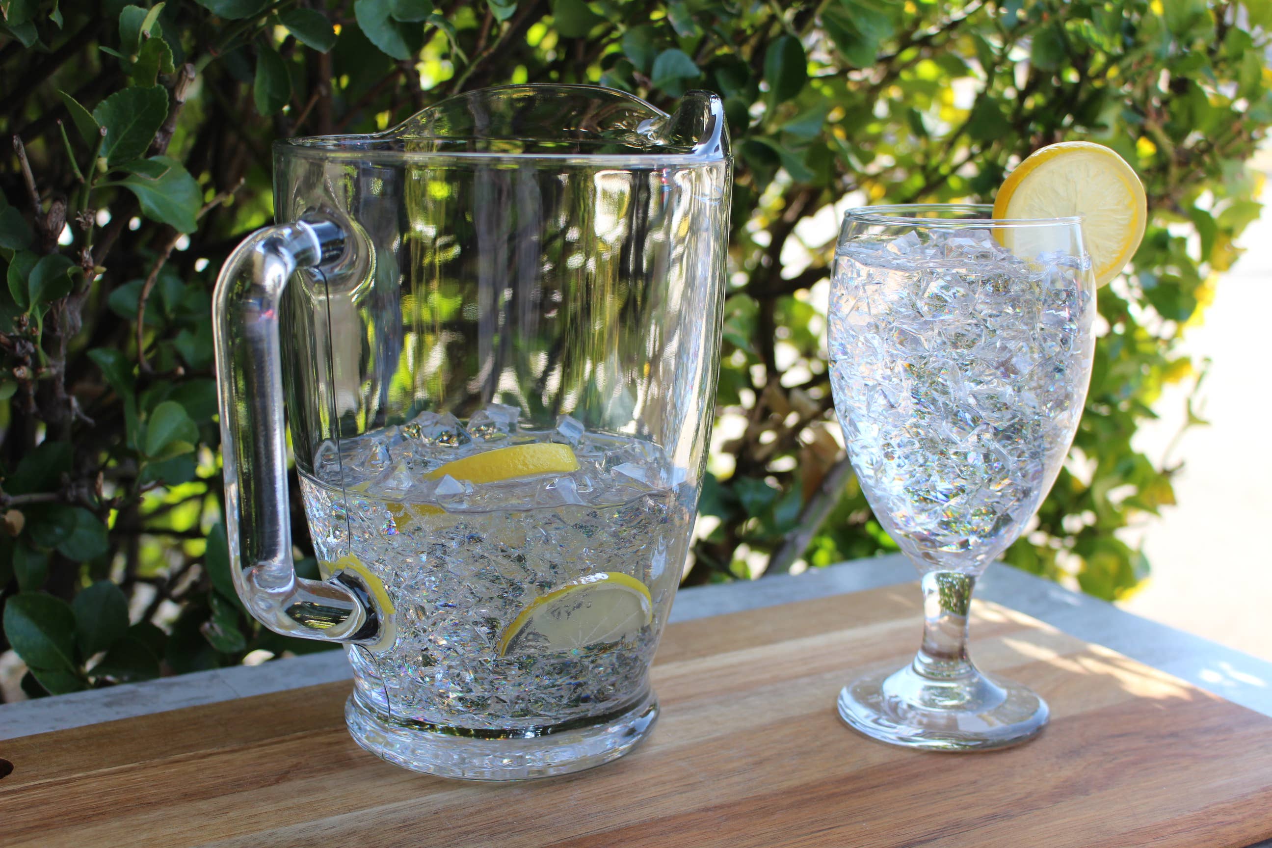 Fake iced water pitcher — styled display alongside matching fake water glass
