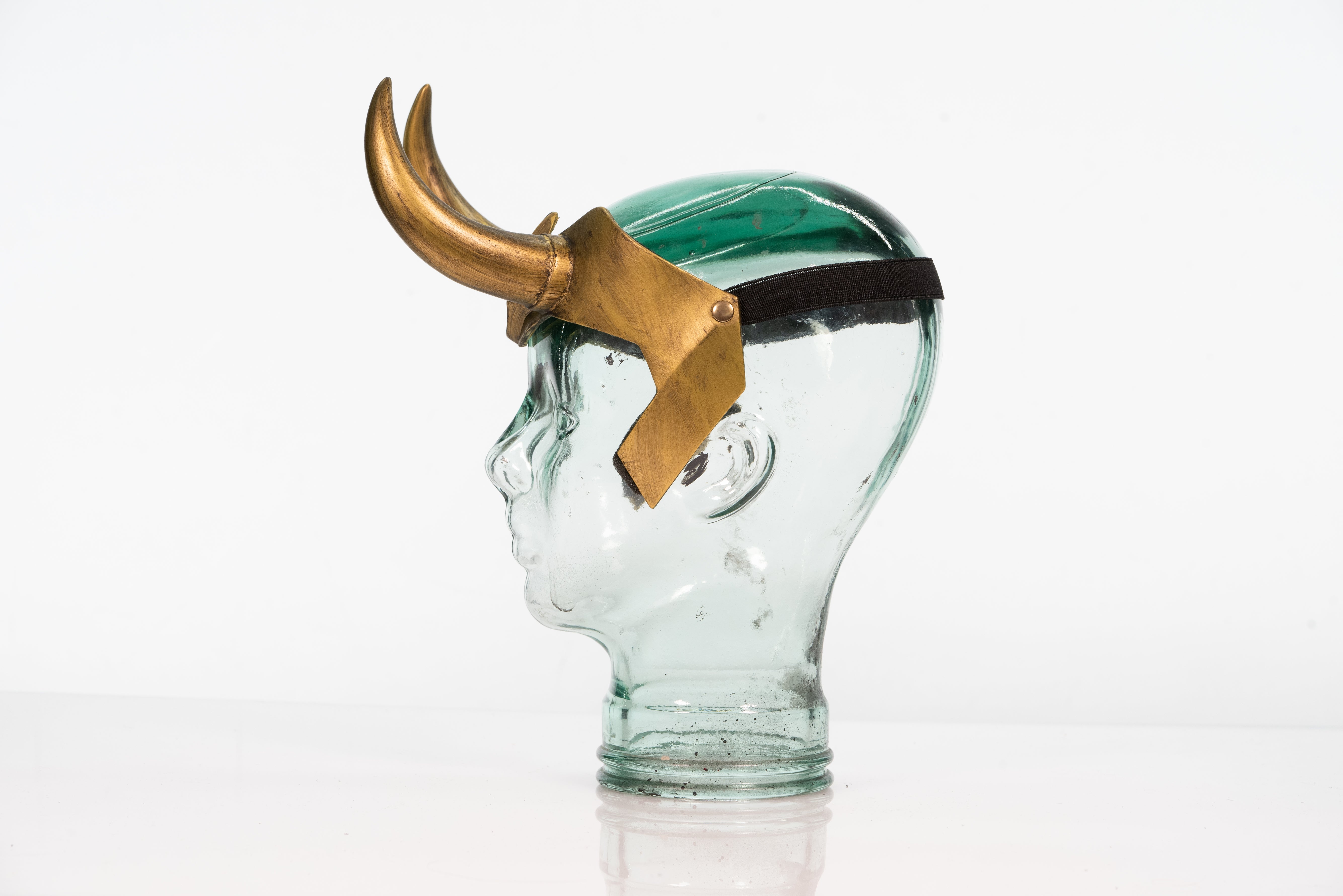 Loki Crown — side view showing horn shape and gold paint finish