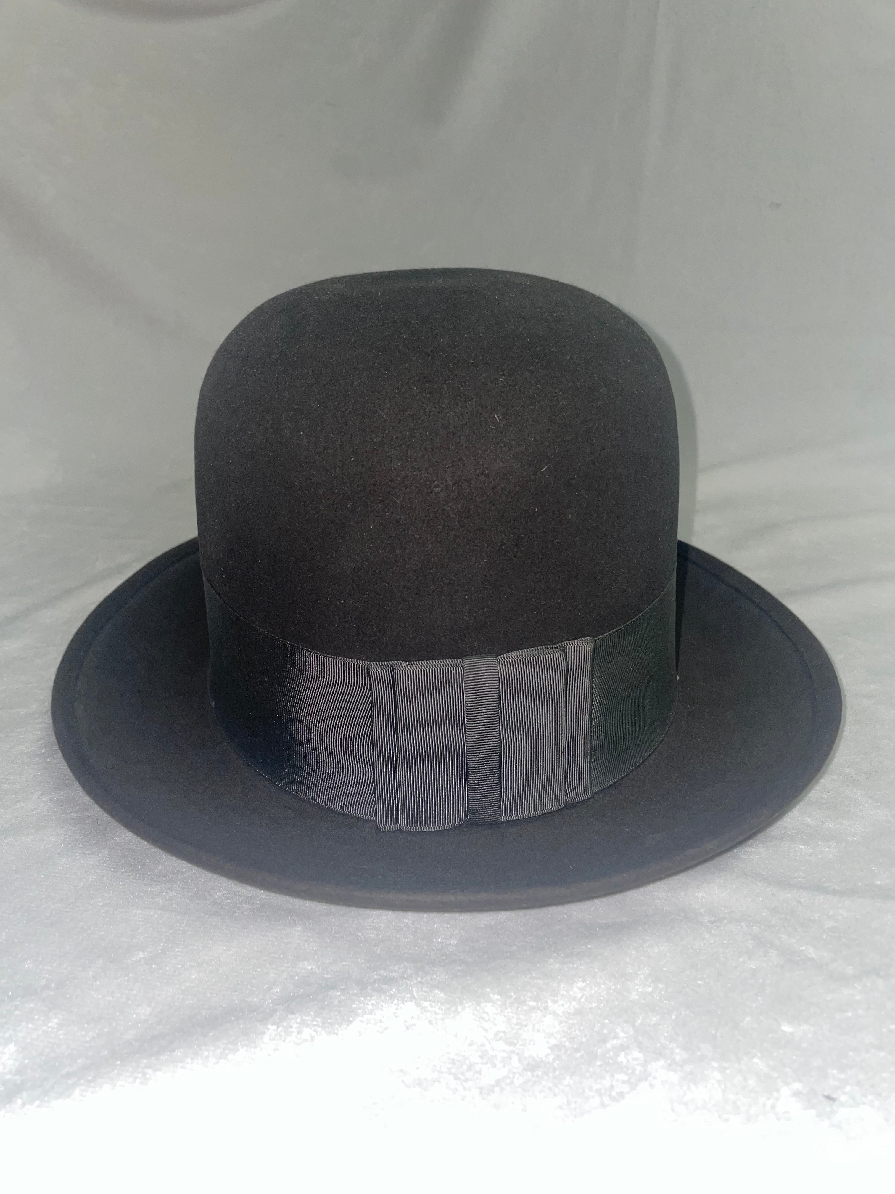 Vintage grey bowler hat — interior view showing lining and sizing band