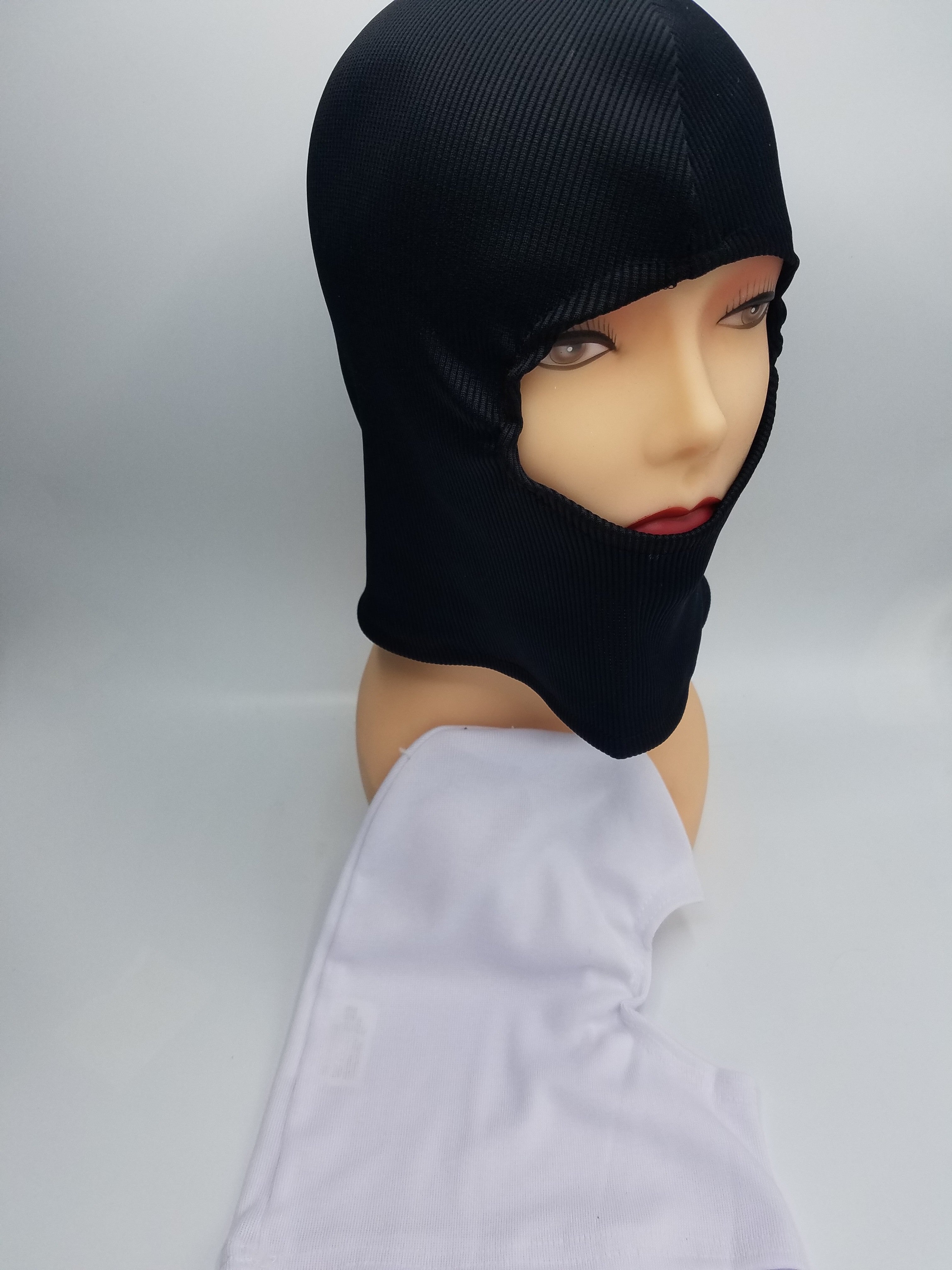 Stretch hood — stretchable knit, fits over head with face exposed, shown in white and black