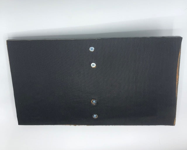 Non-skid floor plate — underside view showing non-skid surface covering