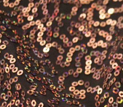 Sequin stretch fabric — black with copper sequins swatch, 51" wide